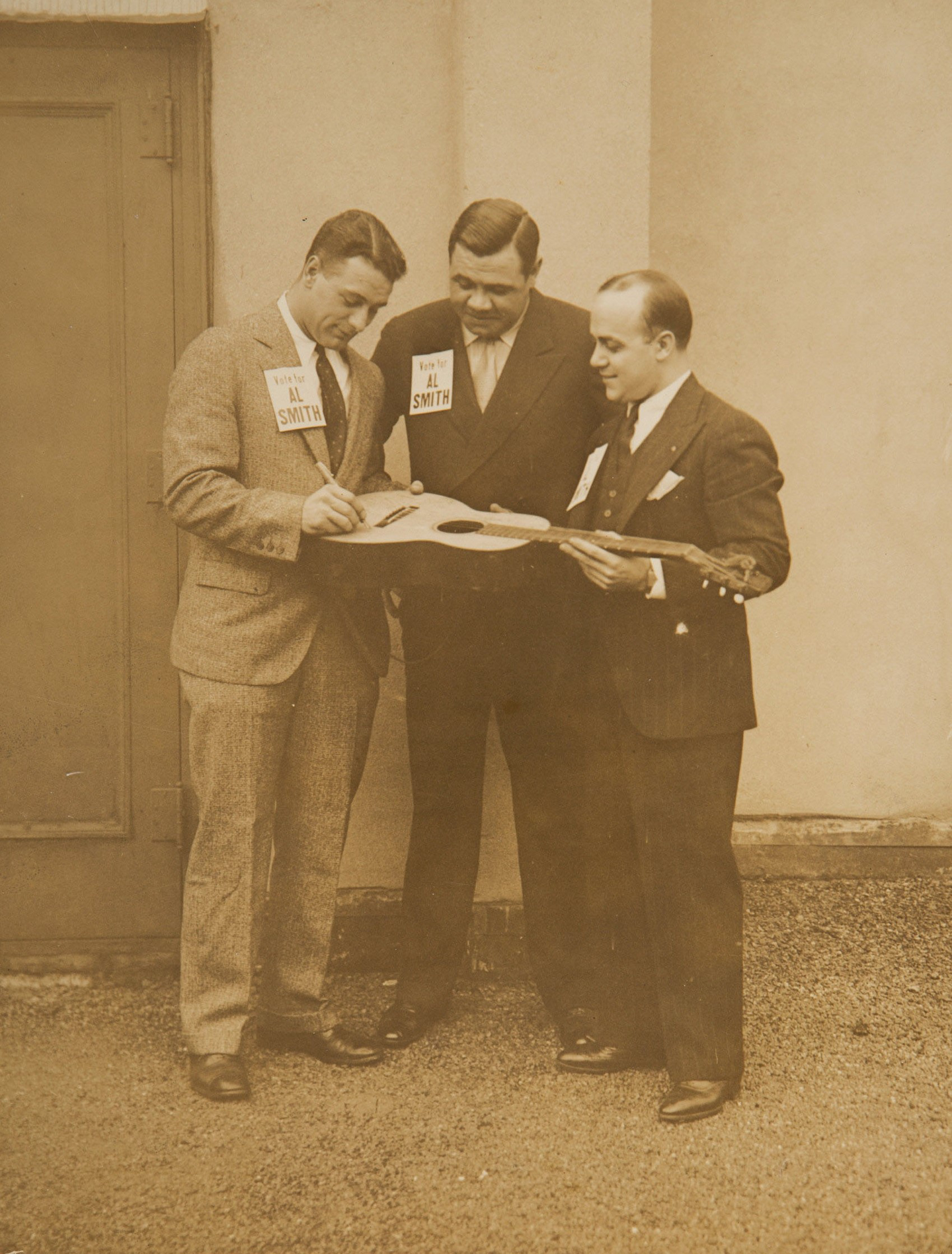 Lou signing the guitar